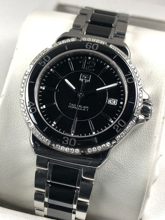 WAH1212-BA0859 שעון יוקרה של טאג הויאר יד 2 | דגם משובץ 60 יהלומים | רצועת פלדה משולבת קרמיקה | עמידות גבוהה למים | מצב חדש !! שנה אחריות | TAG Heuer Formula 1 Ladies Watch