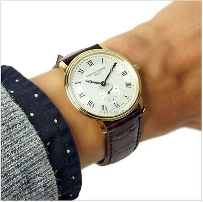 FC-235M4S5 פרדריק קונסטנט שעון יוקרה לגבר דגם מסדרת סלימליין דגם דק במיוחד ברצועת עור חומה | לוח לבן מיוחד רומיות | שעון שניון קטן בלוח | שנתיים אחריות Frederique Constant Slimline Quartz FC-235M4S5