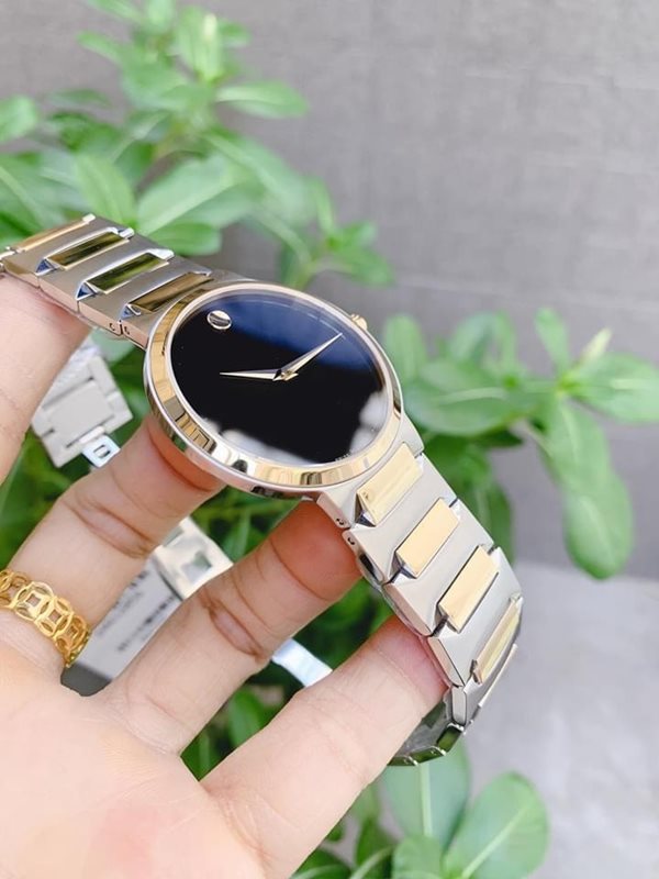 0607293 מובאדו שעון לגבר אלגנטי יוקרתי | דגם משולב זהב וכסף בלוח שחור נקי וקלאסי | שעונים שווצריים במבצע | מלאי מוגבל | שנתיים אחריות | Movado Temo Black Dial Two-Tone Men';s Watch 0607293