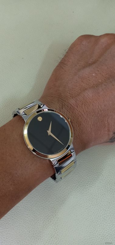 0607293 מובאדו שעון לגבר אלגנטי יוקרתי | דגם משולב זהב וכסף בלוח שחור נקי וקלאסי | שעונים שווצריים במבצע | מלאי מוגבל | שנתיים אחריות | Movado Temo Black Dial Two-Tone Men';s Watch 0607293