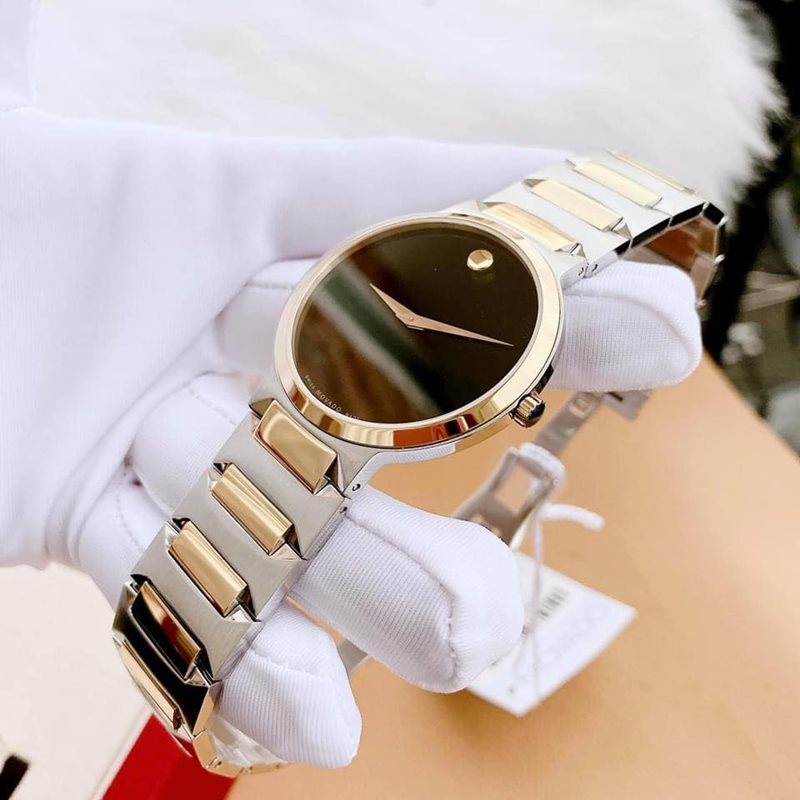 0607293 מובאדו שעון לגבר אלגנטי יוקרתי | דגם משולב זהב וכסף בלוח שחור נקי וקלאסי | שעונים שווצריים במבצע | מלאי מוגבל | שנתיים אחריות | Movado Temo Black Dial Two-Tone Men';s Watch 0607293