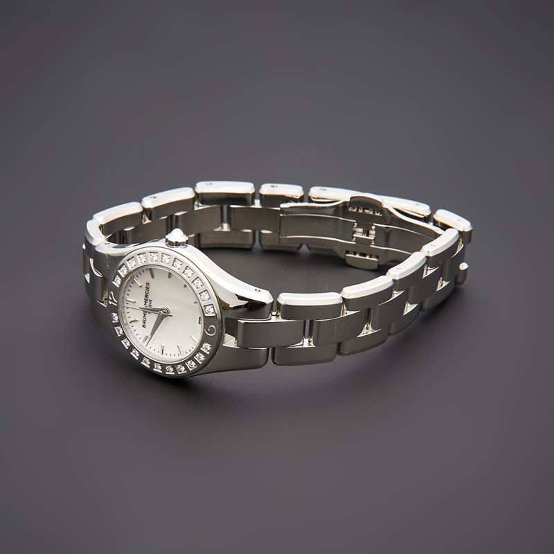 10078 שעון יוקרה לנשים של המותג השווצרי באום & מרסייה | באזל השעון משובץ ב 22 יהלומים | מגיע עם רצועת עור נוספת | לוח פנינה מרשים | שנתיים אחריות |10078 | Baume & Mercier Linea Diamond-set Steel 27mm