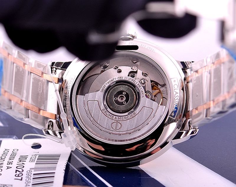 10297 שעון יוקרה של באום מרסייה לאישה 18K | דגם אוטומטי משובץ 8 יהלומים בלוח פנינה חום/אפור מיוחד | רצועה ובאזל מזהב 18K מלאי מוגבל | שנתיים אחריות Baume & Mercier Classima Automatic 36mm MOA10297