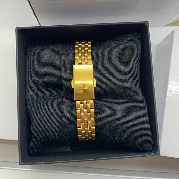 SYMA22K1 סייקו 5 מיני לאישה | דגם אוטומטי בלוח לבן מחוגים זוהרים בחשכה | תאריכון כפול | שנתיים אחריות | SEIKO 5 SYMA22K1 Automatic Gold Stainless Steel Watch