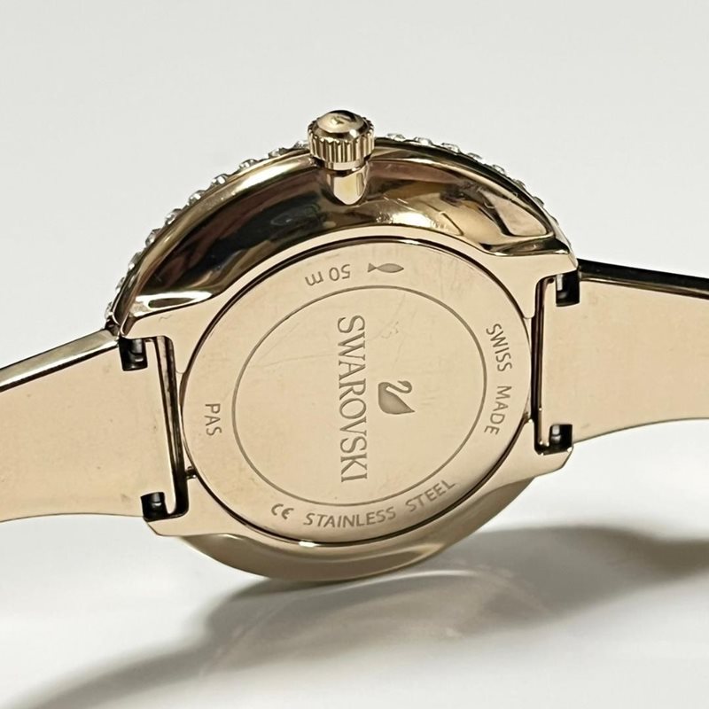 5484045 שעון יד סברובסקי זהב משובץ אבני סברובסקי בבאזל ובלוח | שעוןיד בסגנון צמיד | שעון אופנתי יוקרתי לאישה | Swarovski Crystal Rose Watch Metal bracelet, Golden 5484045