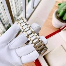 0607278 שעון מובאדו אלגנטי קלאסי לגבר | דגם משולב זהב לוח שחור נקי ומיוחד | שעון שווצרי יוקרתי דק | שנתיים אחריות | Movado Stiri Two-Tone Mens Watch 0607278