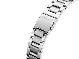 WAR1314.BA0778 שעון יוקרה של טאג הויאר לאישה | דגם בלוח פנינה משובת 12 יהלומים כולל תאריכון | מלאי מוגבל | שנתיים אחריות | TAG Heuer Carrera 32mm Quartz Ladies Watch WAR1314.BA0778