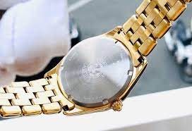 EV1032-51D שעון סיטיזן זהב לאישה בטכנולוגיית אקו דרייב | לוח מיוחד פנינה פסים עם שעון שניות | שעוני אופנה יוקרתיים לנשים | Ladies'; Citizen Eco-Drive Corso Yellow Gold Textured Dial Watch EV1032-51D