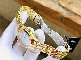 EV1032-51D שעון סיטיזן זהב לאישה בטכנולוגיית אקו דרייב | לוח מיוחד פנינה פסים עם שעון שניות | שעוני אופנה יוקרתיים לנשים | Ladies'; Citizen Eco-Drive Corso Yellow Gold Textured Dial Watch EV1032-51D