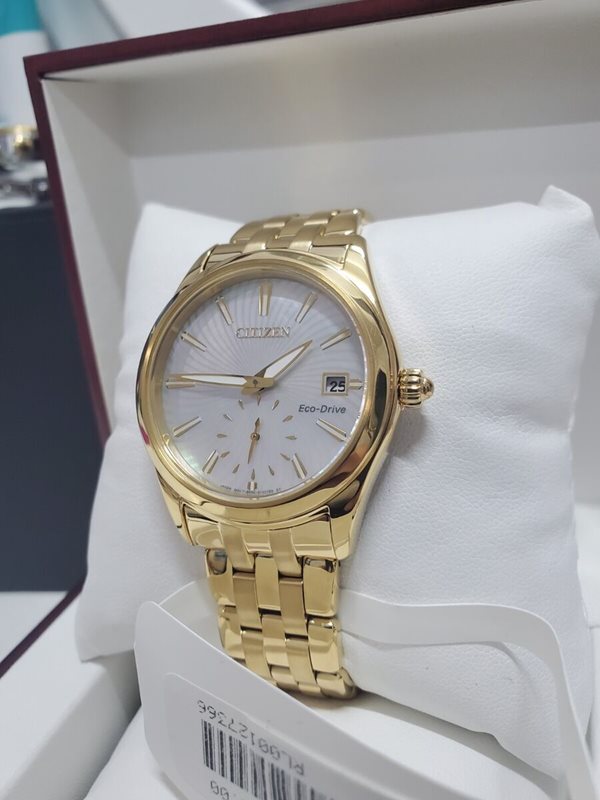 EV1032-51D שעון סיטיזן זהב לאישה בטכנולוגיית אקו דרייב | לוח מיוחד פנינה פסים עם שעון שניות | שעוני אופנה יוקרתיים לנשים | Ladies'; Citizen Eco-Drive Corso Yellow Gold Textured Dial Watch EV1032-51D