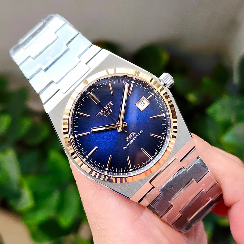 T931.407.41.041.00 שעון טיסו מיוחד לגברים | באזל זהב 18K בלוח כחול מיוחד | מנגנון אוטומטי 80 שעות | מלאי מוגבל | 3 שנים אחריות | Tissot PRX Powermatic 80 Steel & 18K Gold Bezel T9314074104100