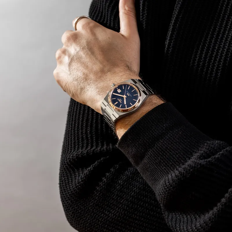 T931.407.41.041.00 שעון טיסו מיוחד לגברים | באזל זהב 18K בלוח כחול מיוחד | מנגנון אוטומטי 80 שעות | מלאי מוגבל | 3 שנים אחריות | Tissot PRX Powermatic 80 Steel & 18K Gold Bezel T9314074104100