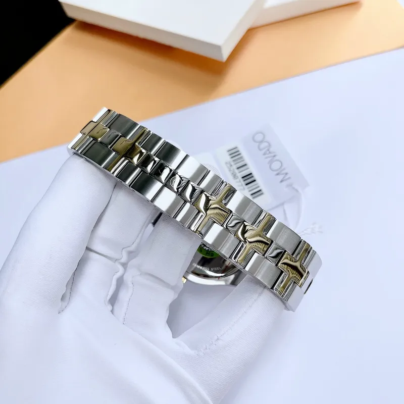 0607443 שעון מובאדו שוויץ יוקרתי לגברים | דגם אלגנטי בלוח | רצועה משולבת זהב | שנתיים אחריות | Movado 0607443 Juro Two-Toned with Black Dial Men';s