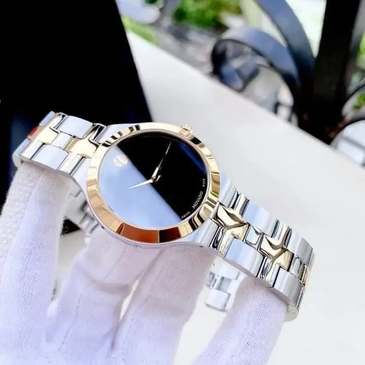 0607443 שעון מובאדו שוויץ יוקרתי לגברים | דגם אלגנטי בלוח | רצועה משולבת זהב | שנתיים אחריות | Movado 0607443 Juro Two-Toned with Black Dial Men';s