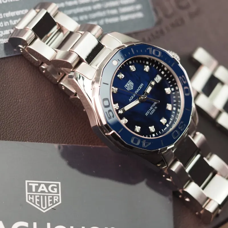 WAY131L.BA0748 שעון טאג הויאר אקוורייסר לנשים | דגם בלוח פנינה כחול מיוחד משובץ 11 יהלומים | 300 מטר | שנתיים אחריות | TAG Heuer Aquaracer Quartz 35mm Ladies Watch Blue