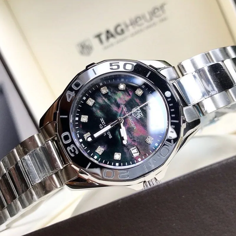 WAY131M.BA0748 שעון טאג הויאר לנשים משובץ 11 יהלומים לוח שחור פנינה | דגם 300 מטר מסדרת אקווה רייסר | שנתיים אחריות | TAG Heuer Aquaracer Lady Black/Steel ?35 mm,model WAY131M.BA0748