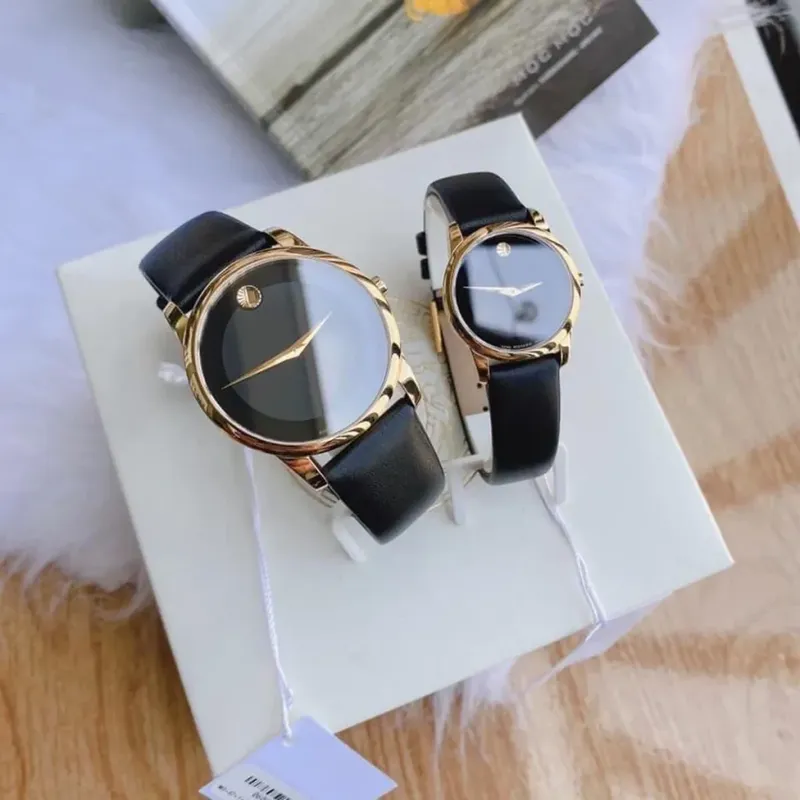 0606877 שעון מובאדו לאישה ברצועת עור | דגם זהב בלוח שחור נקי קלאסי ואלגנטי | מלאי מוגבל | שנתיים אלריות יבואן רשמי | Movado Museum Dial Gold tone case on Black Leather strap 28mm 0606877