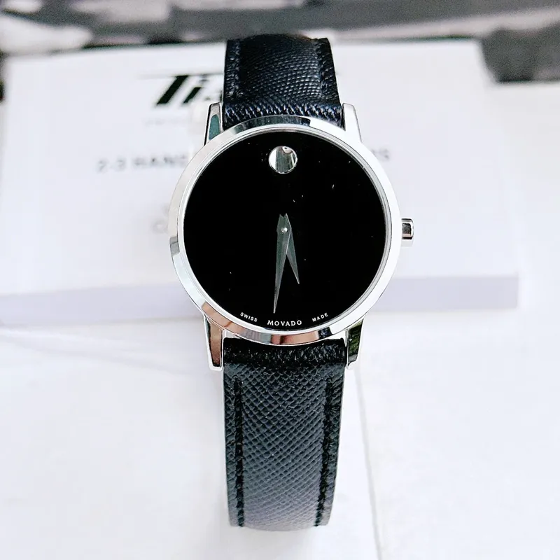 0607204 שעון מובאדו לנשים דגם ברצועת עור שחורה לוח שחור מסדרת מוזיאון | שנתיים אחריות יבואן רשמי | Movado Women';s Museum 28mm Black Leather Band Steel Case Quartz Watch 0607204