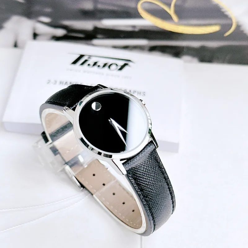 0607204 שעון מובאדו לנשים דגם ברצועת עור שחורה לוח שחור מסדרת מוזיאון | שנתיים אחריות יבואן רשמי | Movado Women';s Museum 28mm Black Leather Band Steel Case Quartz Watch 0607204