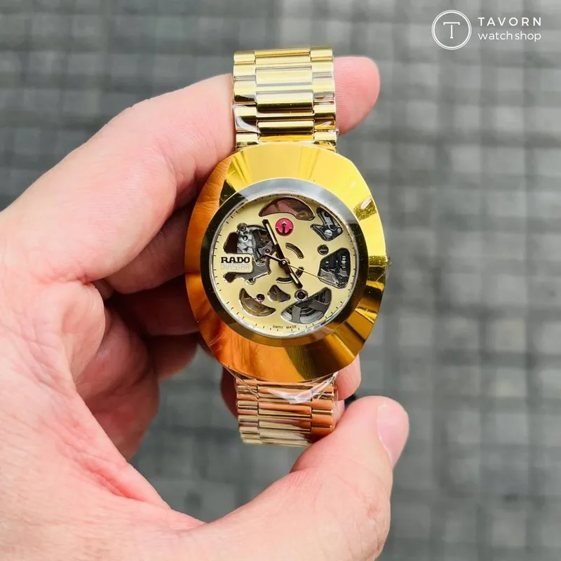 R-60643025 שעון ראדו יבואן רשמי מסדרת אוריג';נל | דגם חדש סקלטון 35 מ';';מ יוניסקס | מנגנון אוטומטי | מלאי מוגבל | 5 שנים אחריות | Rado The Original Automatic Gold Skeleton Watch R12064253