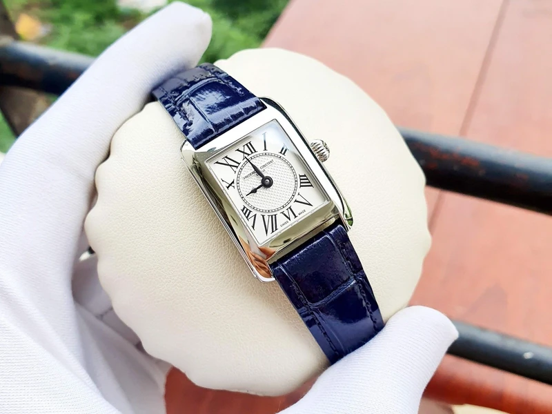 FC-200MC16 שעון יוקרתי מלבני לאישה של פרדריק קונסטנט | דגם אלגנטי אופנתי ברצועת עור כחולה | לוח רומי כולל שנתיים אחריות יבואן רשמי | Frederique Constant Classic Carree 23mm Ladies Watch FC-200MC16