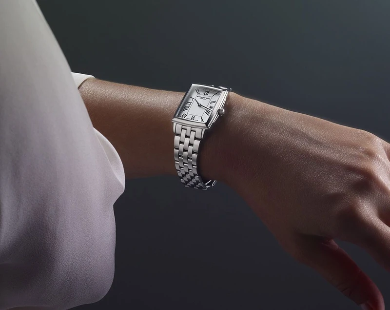 5925-ST-00300 שעון ריימונד וייל לנשים מסדרת טוקטה החדשה | שעון מלבני יוקרתי אופנתי בלוח רומי לבן | שנתיים אחריות יבואן רשמי | Raymond Weil Toccata Quartz Watch | 5925-ST-00300