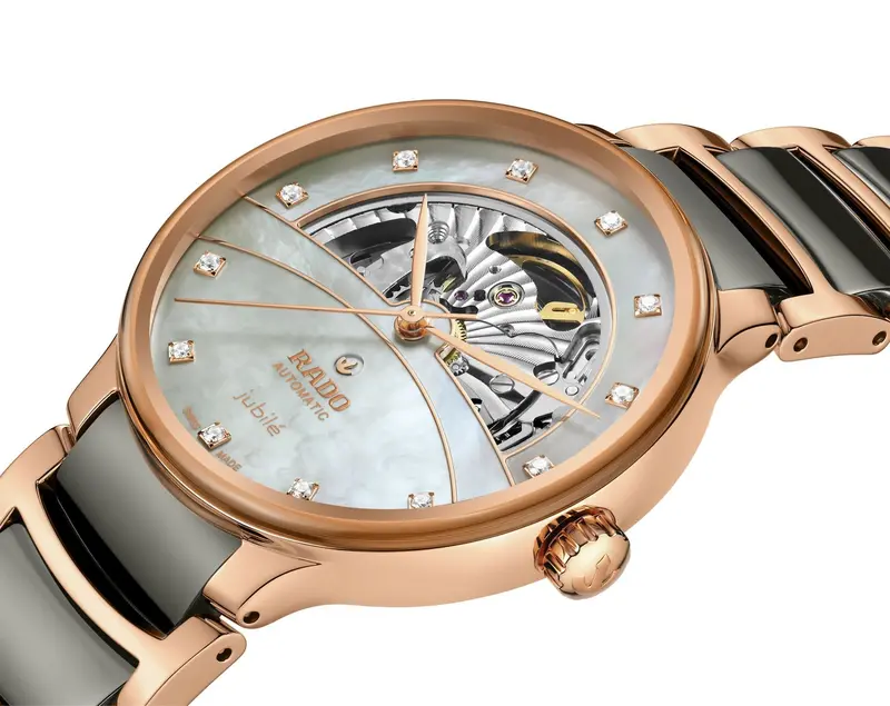 R-60283091 | R30028912 שעון ראדו יבואן רשמי לגברים מסדרת סנטריקס רוז גולד | דגם קרמיקה אוטומטי סקלטון | לוח פנינה משובץ 12 יהלומים | 5 שנים אחריות | Rado Centrix Automatic Diamonds Open Heart R3002891