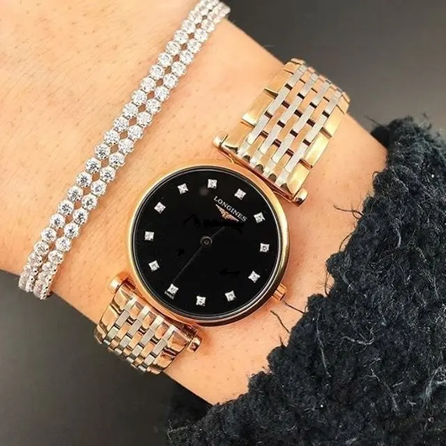 L47091577 שעון יד לונג';ין לאישה | דגם טוטון זהב רוז דק מאד מסדרת לה גרנדה | לוח שחור משובץ 12 יהלומים כולל שנתיים אחריות | מלאי מוגבל | Longines La Grande Classique De Longines L4.709.1.57.7