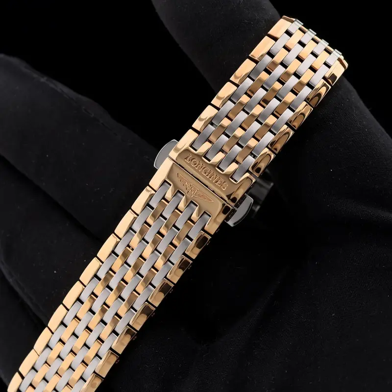 L47091577 שעון יד לונג';ין לאישה | דגם טוטון זהב רוז דק מאד מסדרת לה גרנדה | לוח שחור משובץ 12 יהלומים כולל שנתיים אחריות | מלאי מוגבל | Longines La Grande Classique De Longines L4.709.1.57.7