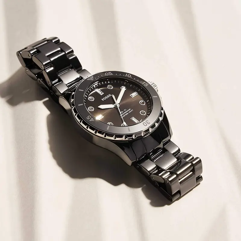 CE1108 שעון קרמי של פוסיל לנשים דגם שחור 36 מ';';מ | שעון אופנתי יוקרתי בלוח שחור קריסטלים | Fossil FB-01 Analog Ceramic Black Dial Quartz CE1108