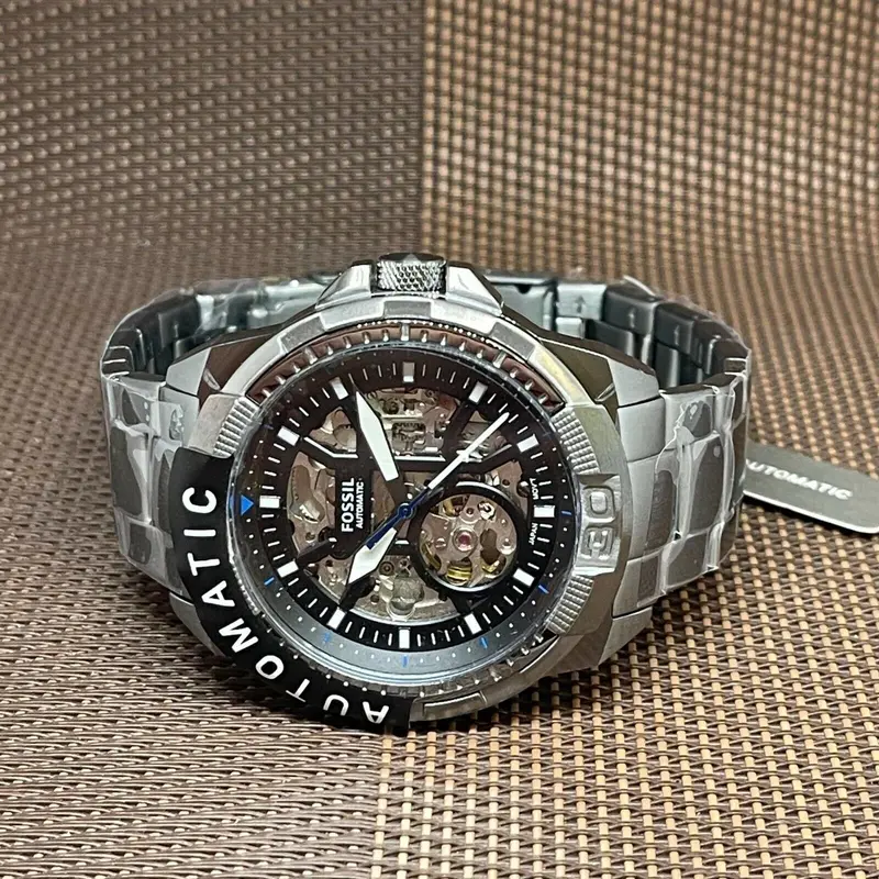 ME3218 שעון אוטומטי לגברים של פוסיל | דגם סקלטון אפור שחור | שעון אופנתי יוקרתי | סדרה חדשה כולל שנתיים אחריות |