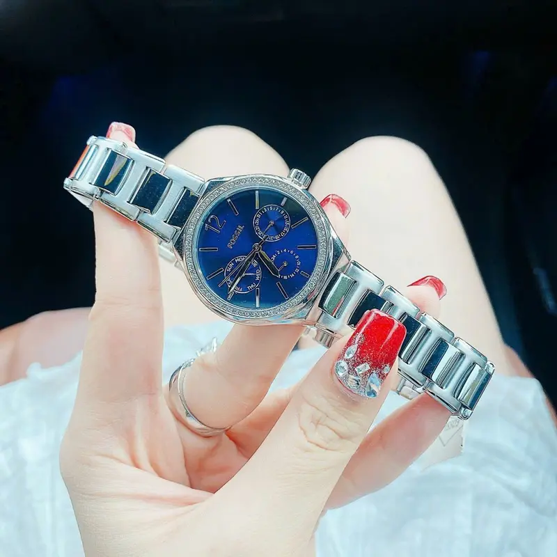 BQ3720 שעון פוסיל לנשים | לוח כחול מיוחד כולל תאריכון ימים | באזל משובץ זרקונים | מלאי מוגבל | שנתיים אחריות | Fossil Eevie Women';s Silver Stainless Steel Watch. BQ3720