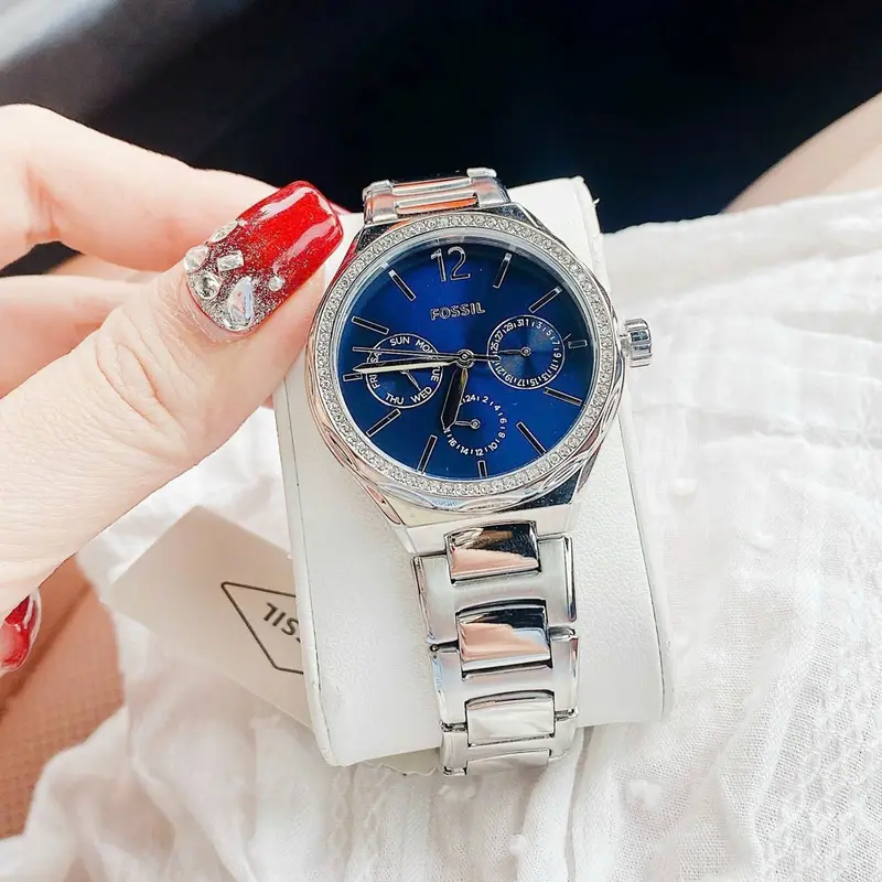 BQ3720 שעון פוסיל לנשים | לוח כחול מיוחד כולל תאריכון ימים | באזל משובץ זרקונים | מלאי מוגבל | שנתיים אחריות | Fossil Eevie Women';s Silver Stainless Steel Watch. BQ3720