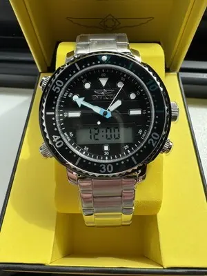 48370 שעון אינוויקטה אנלוגי דיגיטלי לגברים | דגם ברצועת פלדת אל חלד | לוח שחור זרחני באזל טורקיז | כולל תאורה שעון מעורר ועוד |Pro Diver Alarm Chronograph Quartz Analog-Digital Black Dial Men';s Watch