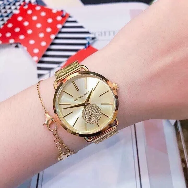 MK3844 שעון מייקל קורס יבואן רשמי | דגם זהב לאישה | לוח פסים עם שעון שניות קטן משובץ קריסטלים| רצועת רשת אופנתית | שנתיים אחריות פלאנט טיים | Michael Kors Watch For Women MK3844 With Gold Dial