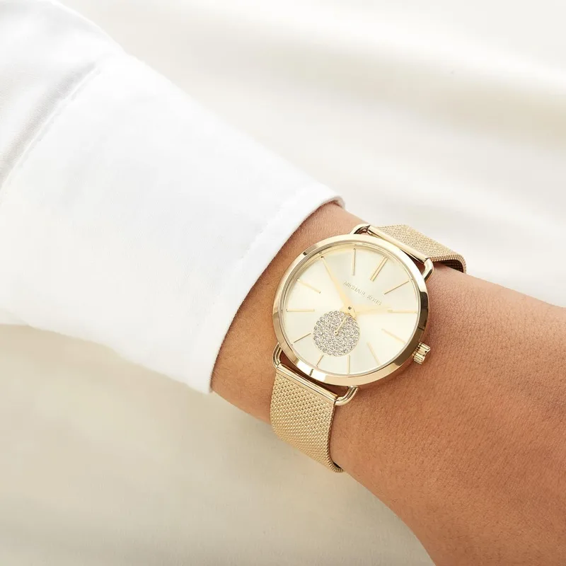 MK3844 שעון מייקל קורס יבואן רשמי | דגם זהב לאישה | לוח פסים עם שעון שניות קטן משובץ קריסטלים| רצועת רשת אופנתית | שנתיים אחריות פלאנט טיים | Michael Kors Watch For Women MK3844 With Gold Dial