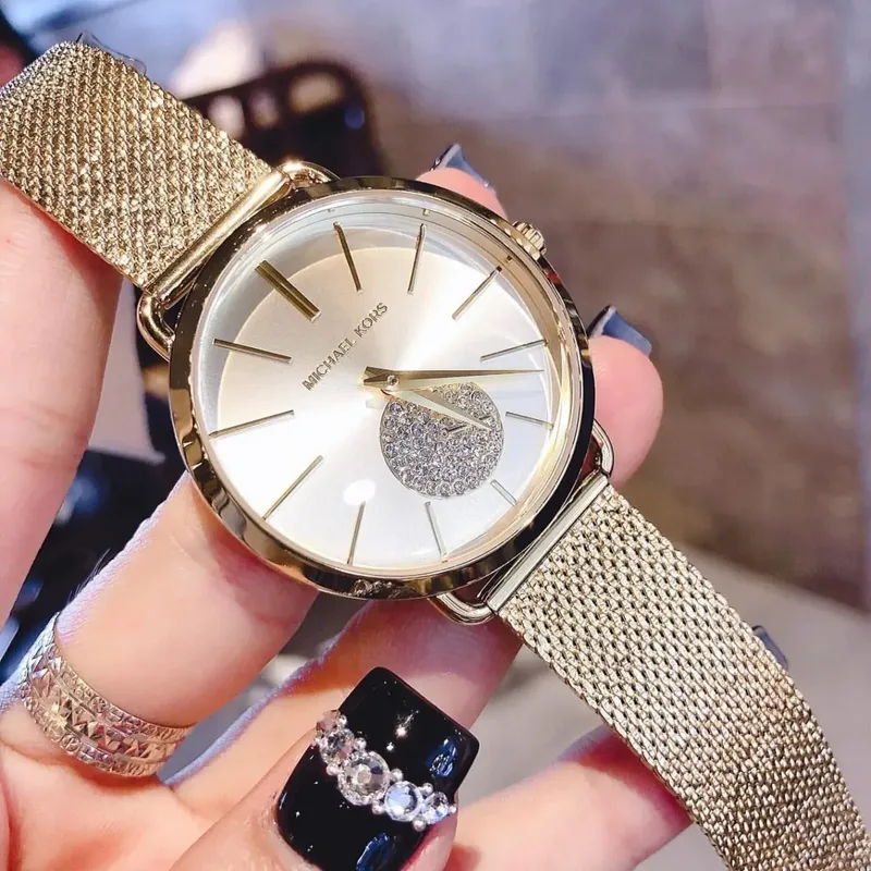 MK3844 שעון מייקל קורס יבואן רשמי | דגם זהב לאישה | לוח פסים עם שעון שניות קטן משובץ קריסטלים| רצועת רשת אופנתית | שנתיים אחריות פלאנט טיים | Michael Kors Watch For Women MK3844 With Gold Dial
