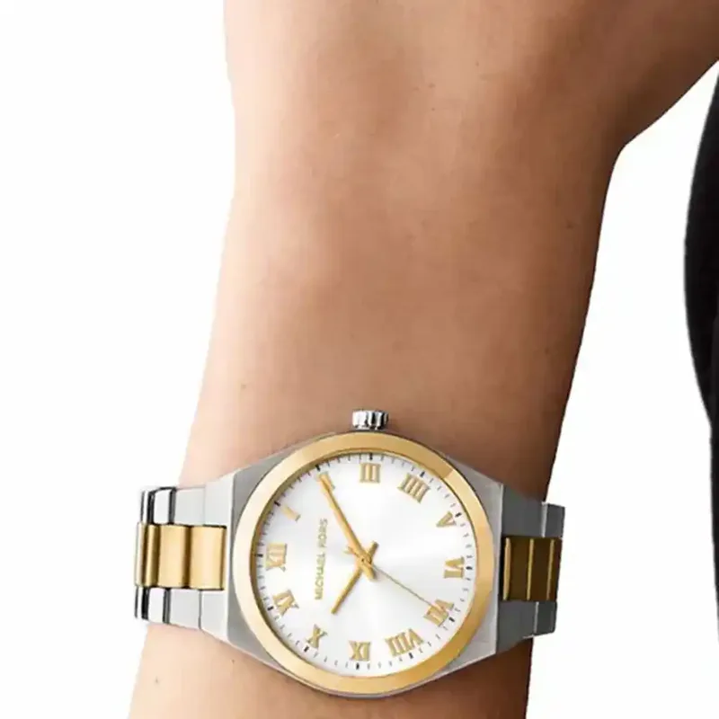 MK7464 שעון מייקל קורס יבואן רשמי לנשים | דגם משולב זהב | לוח רומי לבן קלאסי ואלגנטי | מלאי מוגבל | כולל שנתיים אחריות פלאנט |Michael Kors Lennox Steel Bracelet White Dial Women';s Watch MK7464