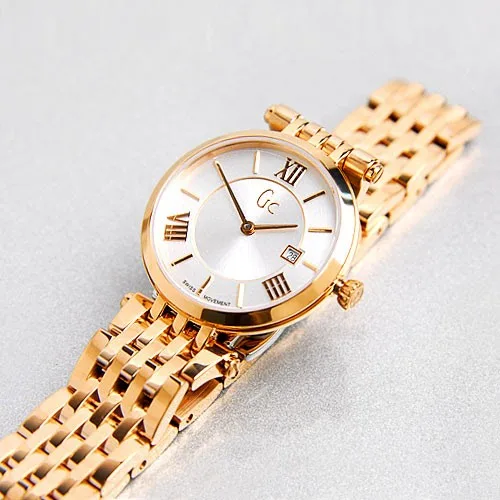 GC-X57003L1S שעון GC שווצרי לאישה | דגם רוז גולד בלוח רומי עם תאריכון | שעון אופנתי איכותי כולל שנתיים אחריות יבואן רשמי | Guess Collection Rose Gold Tone 28mm Silver Dial Women';s Watch X57003L1S
