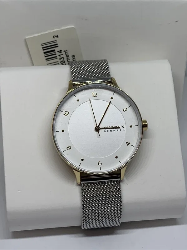 SKW2912 שעון יד סקאגן לאישה | דגם קלאסי לוח מספררים | מסגרת זהב ברצועת רשת אופנתית | שנתיים אחריות יבואן רשמי | Skagen Riis Quartz Silver Dial Ladies Watch SKW2912