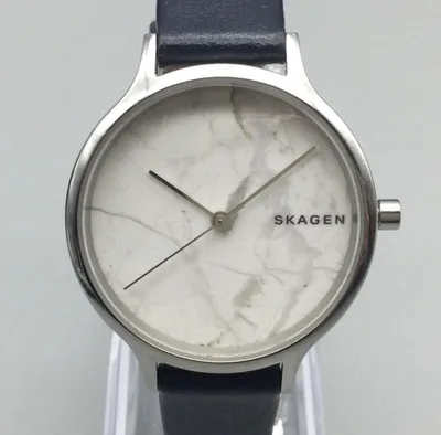 SKW2719 שעון יד סקאגן דנמרק לנשים | דגם בלוח שיש מיוחד | רצועת עור כחולה ואלגנטית | שנתיים אחריות יבואן רשמי | Skagen Anita 34mm Steel White Dial & Blue Band Ladies Quartz Watch SKW2719