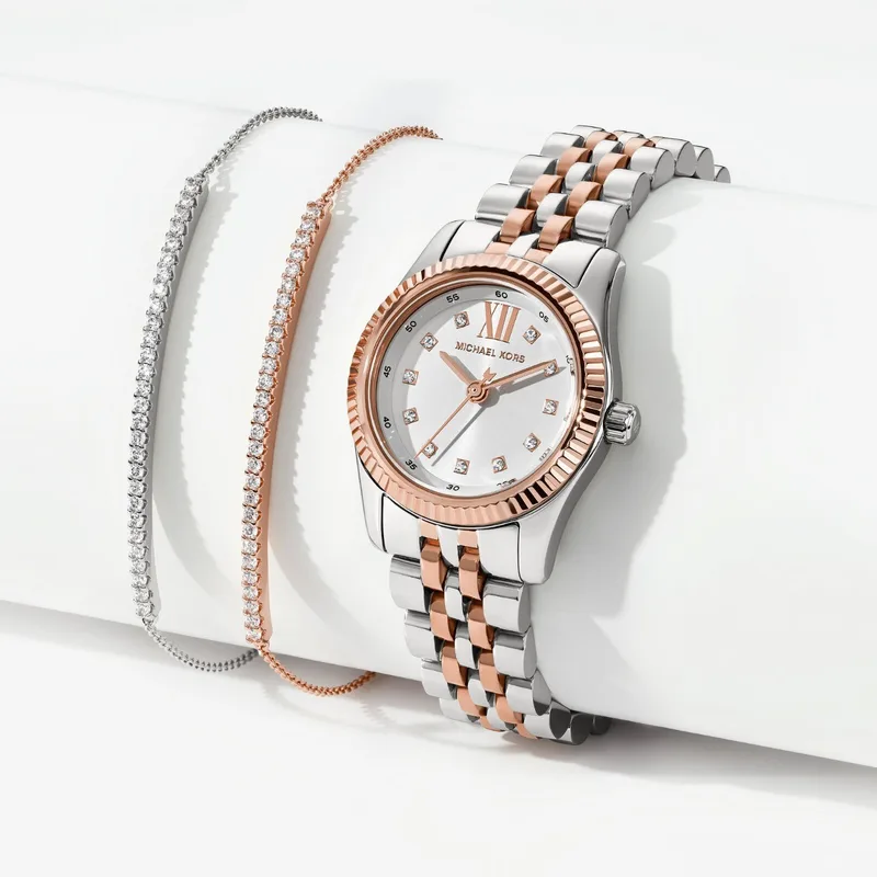 MK4817SET שעון מייקל קורס חדש לנשים | דגם זהב רוז בלוח לבן משובץ אבנים | מגיע כסט עם 2 צמידים של MK | שנתיים אחריות מלאי מוגבל | MK4817SET Michael Kors Lexington Gift Set watch