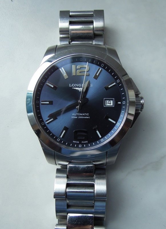שעון יד לונג';ין אוטומטי לגברים יד שנייה | לוח כחול מרשים | סט מלא כולל קופסא וכרטיס יצרן | שנה אחריות | חנות שעונים יד 2 בראשון לציון | Longines Conquest L36764996 Automatic Men';s Watch